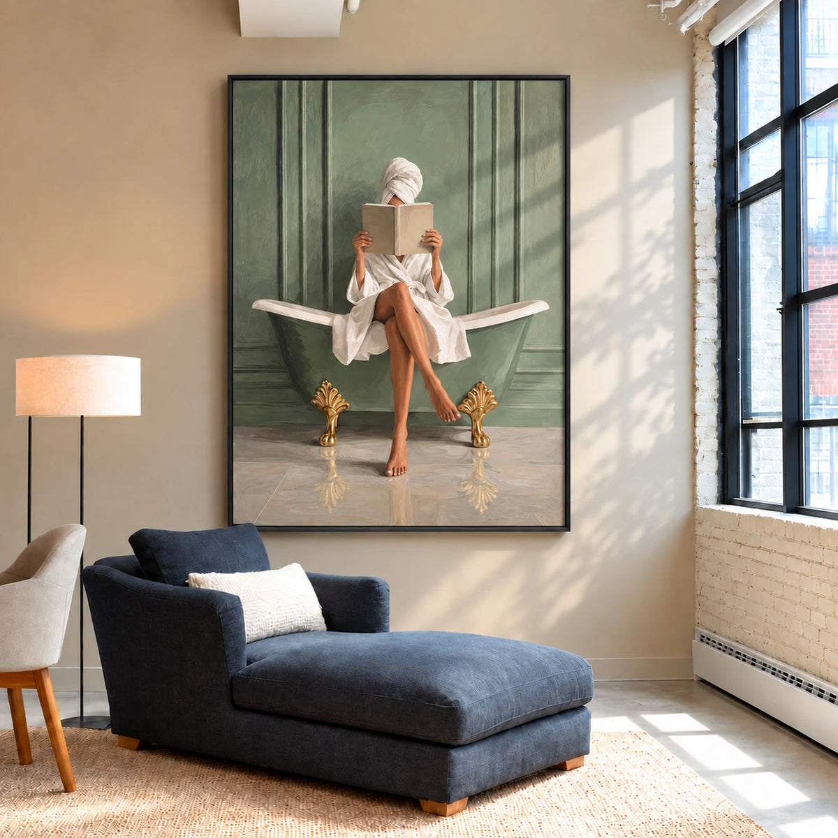 Bath reader painting in a black frame above a blue chaise longue beside tall windows.