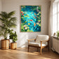 Gold-framed koi pond painting above a cream lounge chair beside houseplants in a sunlit room.