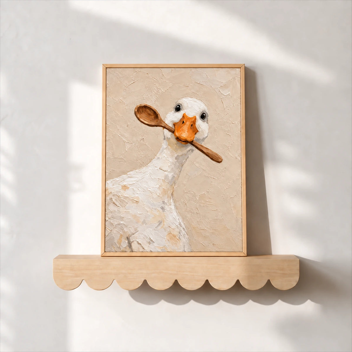 Spoon duck painting in a light wood frame resting on a scalloped wood shelf.