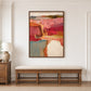 Rose and terracotta abstract painting above a long upholstered wood bench against decorative wall panels.