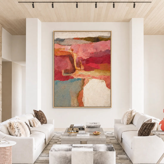 Rose Canyon abstract painting above white sofas in a bright living room with a wood ceiling.