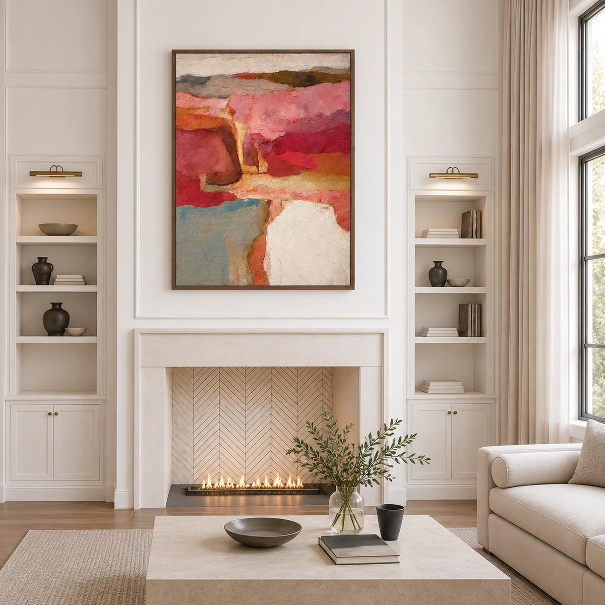 Rose and terracotta abstract painting above a fireplace between recessed shelves.