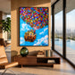 Balloon House painting above a wood console beside a large window with a city view.