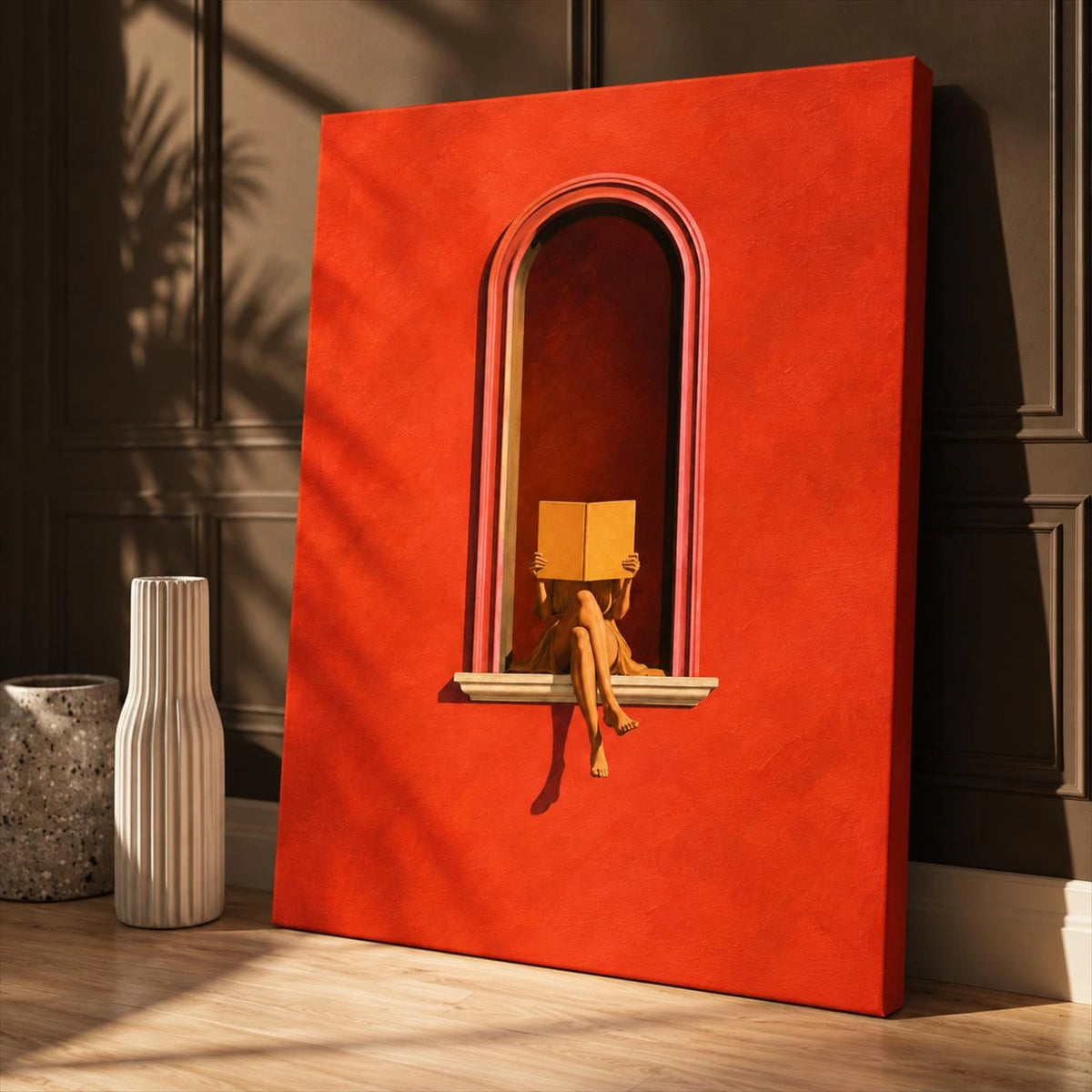 Unframed Scarlet Reader canvas resting on a wood surface beside a ceramic vase in warm light.