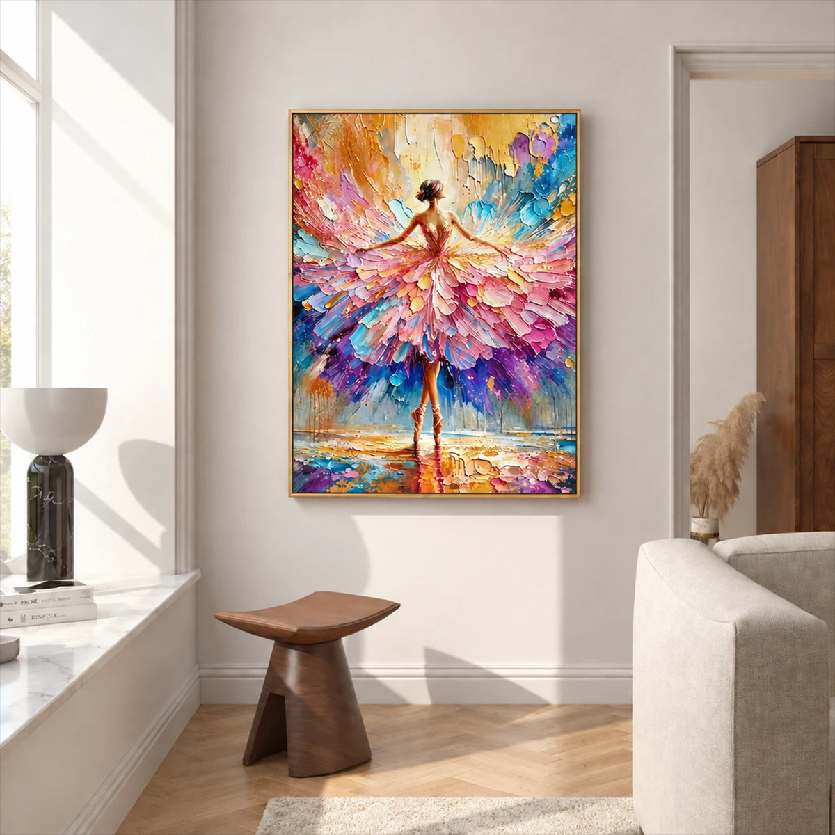 Petal Dancer painting beside a bright window and a small wood stool in a light interior.
