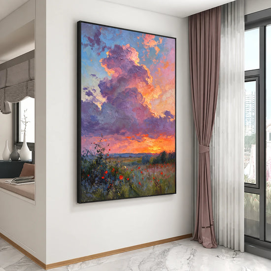 Lavender Sunset painting in a dark frame beside a tall window and mauve curtains.