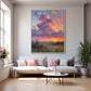 Lavender Sunset painting above a pale sofa with pink cushions in a bright living room.