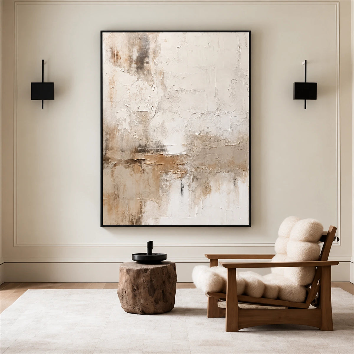 Quiet Earth painting between black wall lights beside a wood lounge chair and a rustic side table.