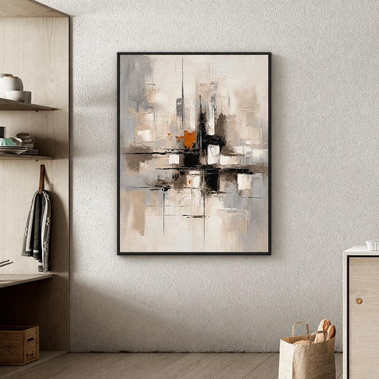 Urban Echo painting in a dark frame beside open shelves and a woven basket.