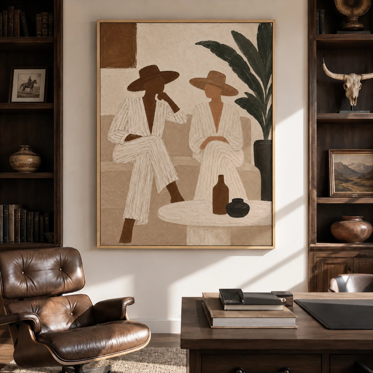Palm Conversation painting between dark shelves beside a leather lounge chair and a wood desk.
