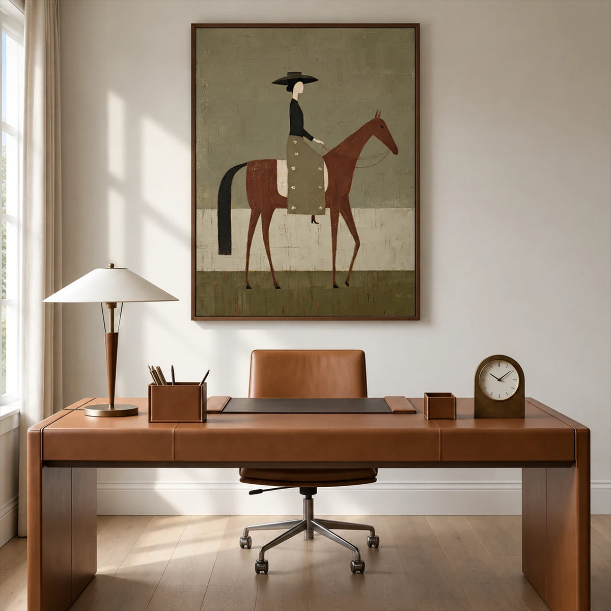 Olive Rider painting above a wood desk and leather chair in a sunlit home office.