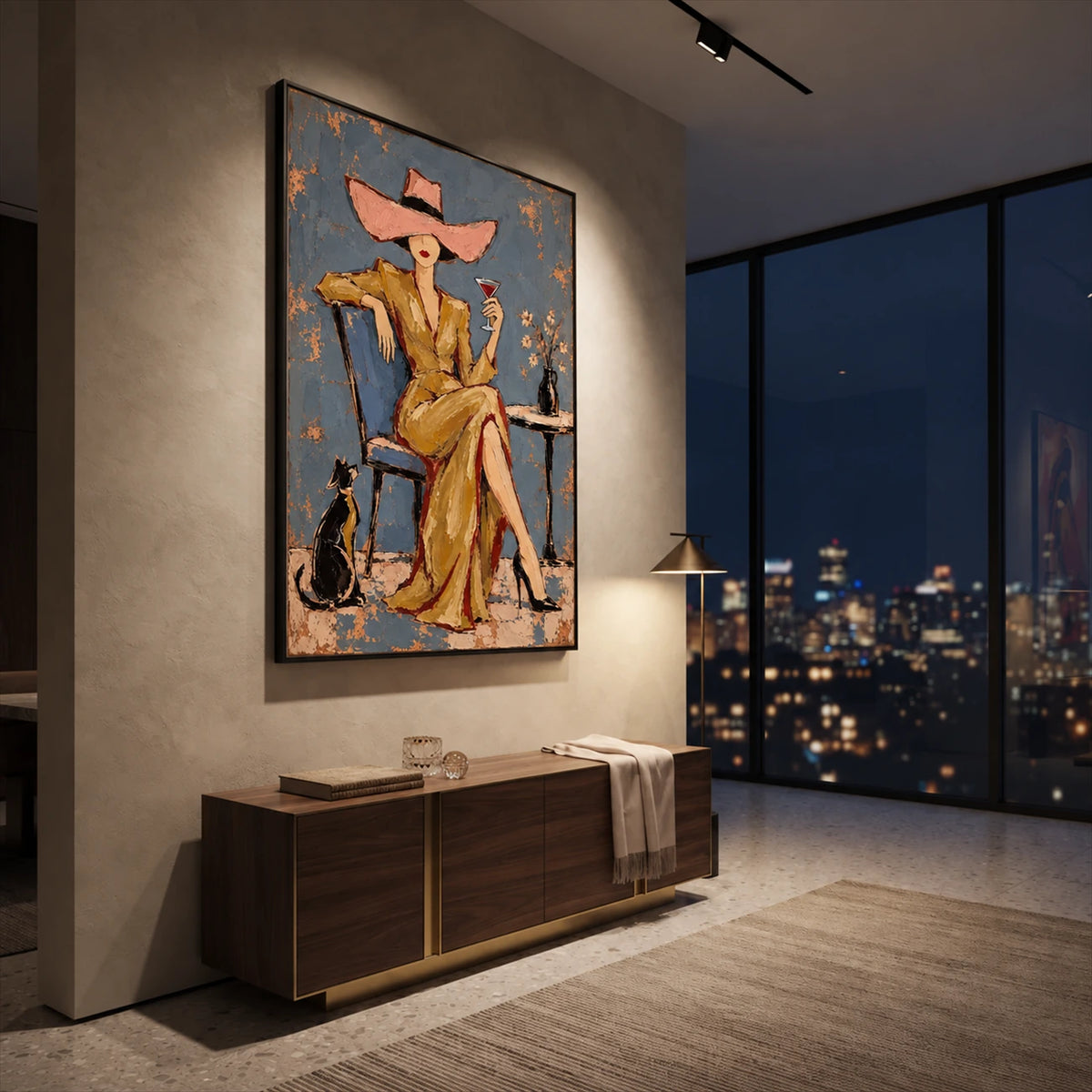 Golden Aperitif painting above a wood console beside tall windows overlooking city lights.