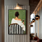 Evening Sip painting in a dark frame on a vertical slat wall beside hanging pendant lights.