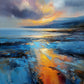 Full seascape with amber sunset light reflected across blue water beneath a violet and gray sky.