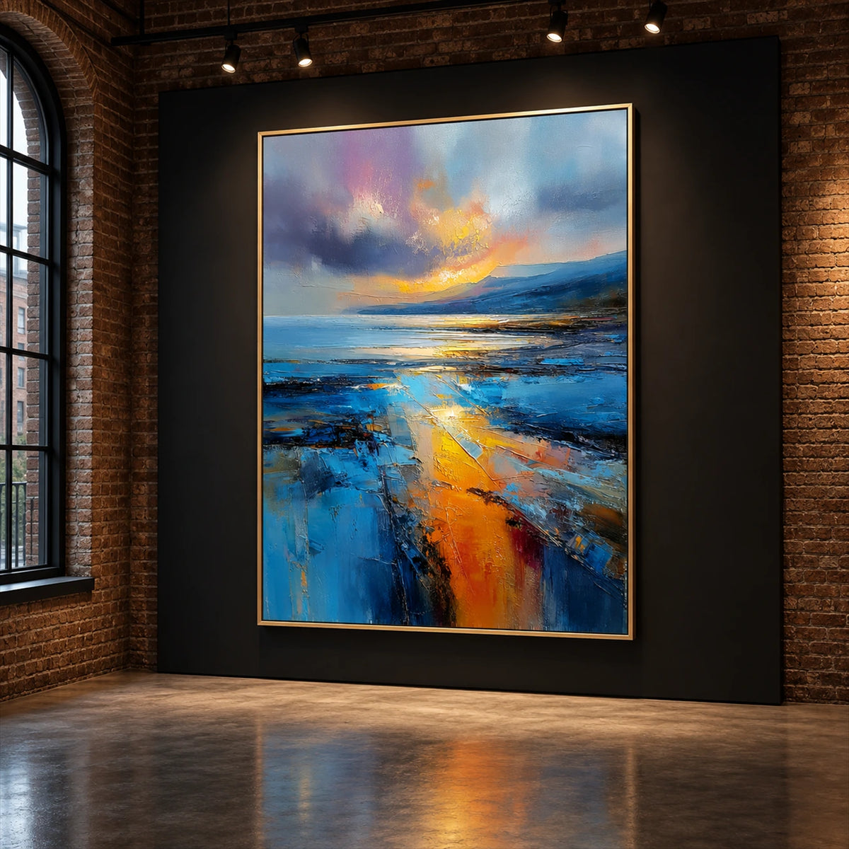 Amber Tide painting on a dark feature wall beside exposed brick and a tall industrial window.