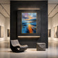 Amber Tide painting on an illuminated gallery wall beside a sculptural lounge chair.