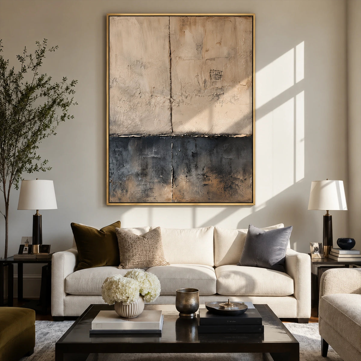 Weathered Calm painting above a cream sofa between two table lamps in a neutral living room.