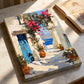 Angled presentation of Coastal Passage on stretched canvas resting on a sunlit tabletop.