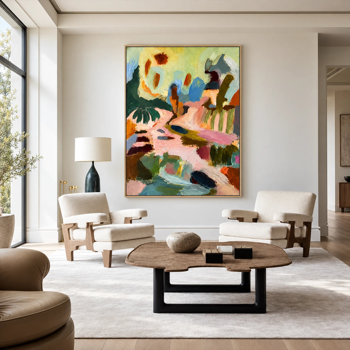 Pastel Reverie painting above two pale armchairs in a spacious neutral living room.