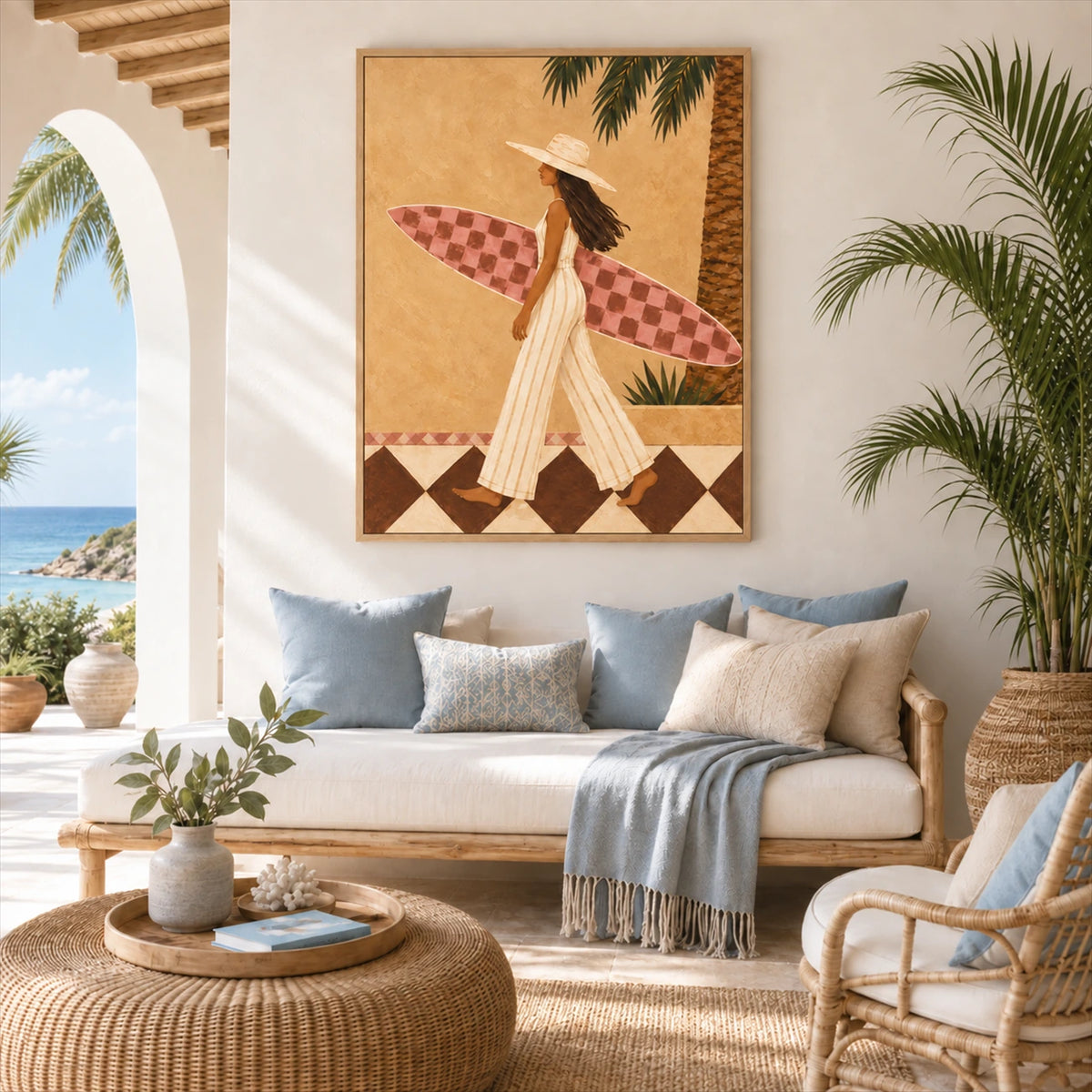 Palmside Surfer painting above a pale sofa with blue cushions in an airy coastal lounge.