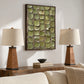 Olive Mosaic painting above a wooden console between two table lamps in a neutral living room.