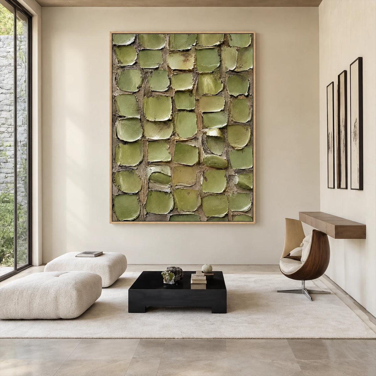 Olive Mosaic painting above a low black table in a minimalist room with sculptural white seating.