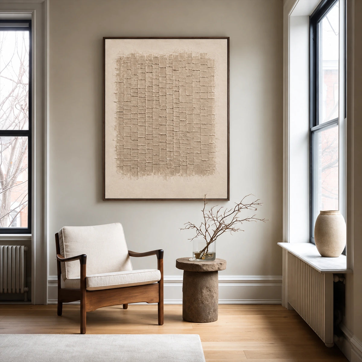 Linen Rhythm painting above a pale wooden armchair beside tall windows and decorative branches.