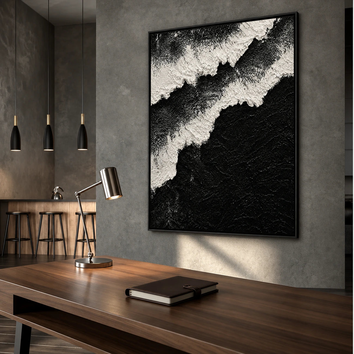 Midnight Surf painting above a wooden desk with a metal task lamp in a concrete interior.