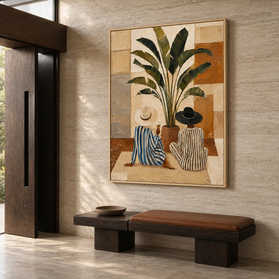 Leafside Companions painting above a dark wooden bench against a stone wall in a spacious entryway.