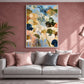 Meadow Reverie painting above a pale sofa with pink and gray cushions against a dusty rose wall.