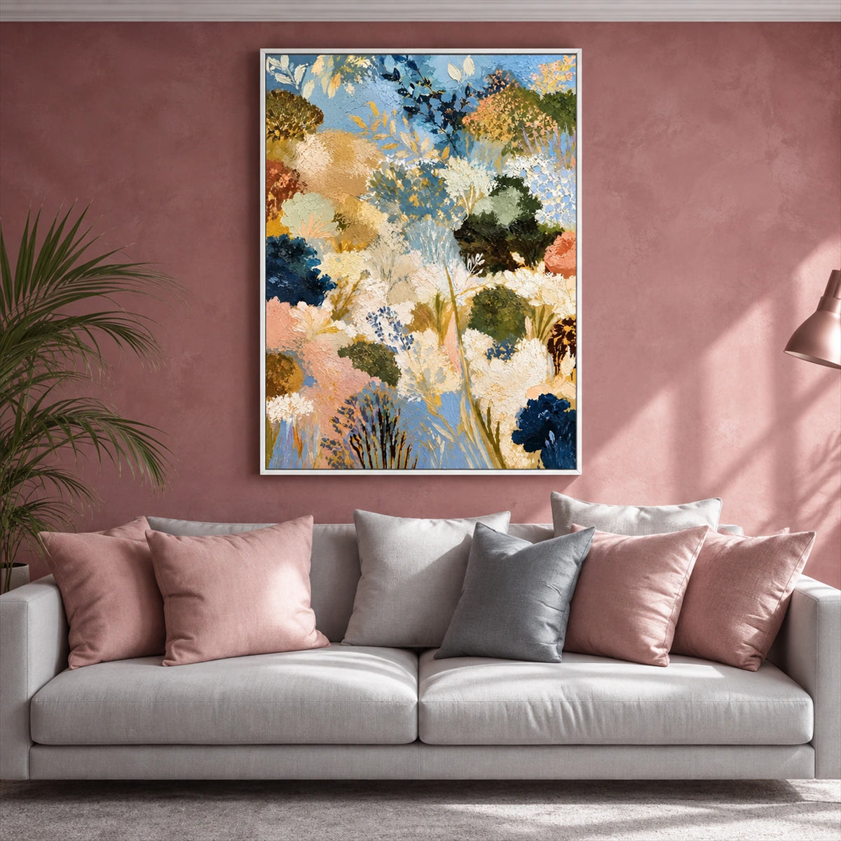 Meadow Reverie painting above a pale sofa with pink and gray cushions against a dusty rose wall.