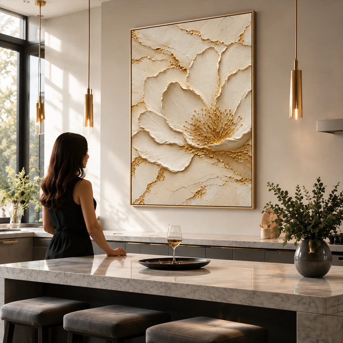 Gilded Blossom painting beside a dining counter and tall windows in a bright interior.
