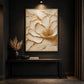 Gilded Blossom painting above a slim black console in a dark room with a vase of dried grasses.