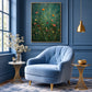 Emerald Wildflowers painting above a pale blue armchair with brass accents in a blue paneled room.