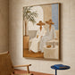 Angled view of Terrace Companions beside a woven chair and a small blue side table.