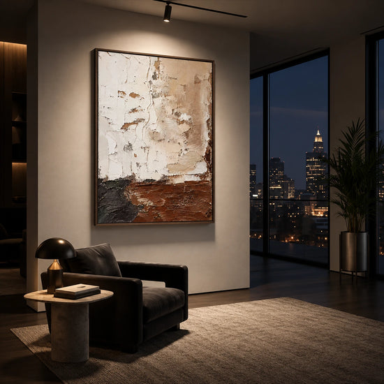Earthen Layers painting beside a dark lounge chair and nighttime city windows.