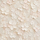 Full botanical artwork of overlapping ivory blossoms and tiny floral details in cream, pale blush and beige.