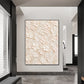 Ivory Petal Garden painting on a pale wall in a monochrome entryway with dark architectural details.
