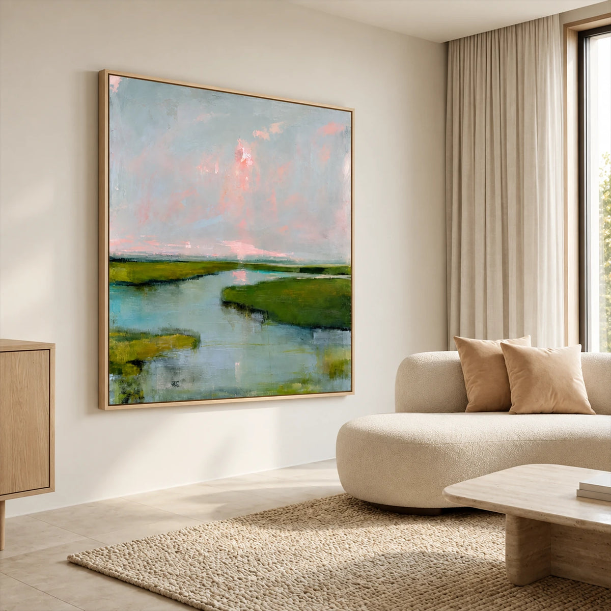 Marshlight Reverie painting above a cream sectional beside a large window.