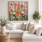 Petal Cascade painting above a white sofa surrounded by green plants.