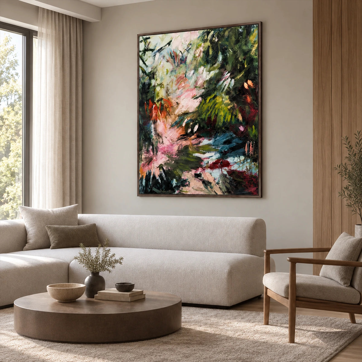 Wild Garden painting above a cream sofa beside a wooden lounge chair.
