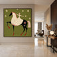 Starlit Rider painting on a pale wall in a spacious entryway.