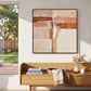 Terracotta Crossing painting above a wooden bench beside a garden-facing window.