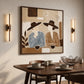 Coffee Companions painting above a round dining table set with cups, between two wall lights.