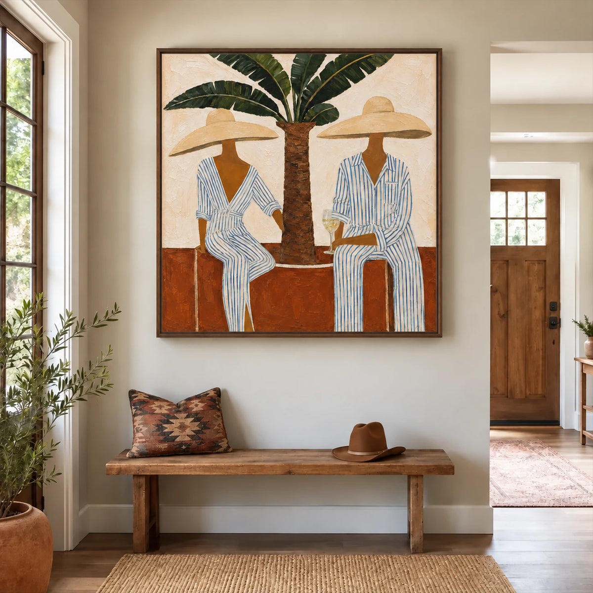 Palmside Leisure painting above a wooden bench beside an entryway.