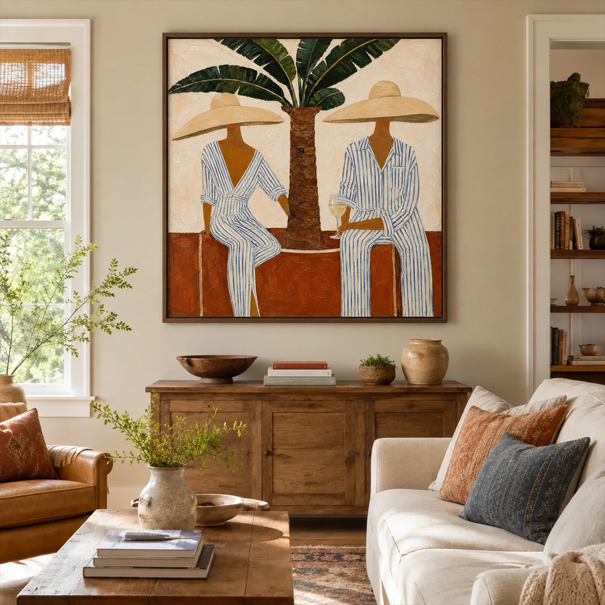 Palmside Leisure painting above a wooden sideboard in a sunlit living room.