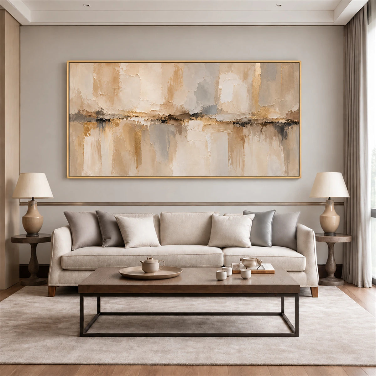 Sandstone Reflection painting above a cream sofa between matching table lamps.