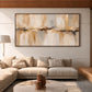 Sandstone Reflection painting above a cream sectional beneath a slatted wooden ceiling.