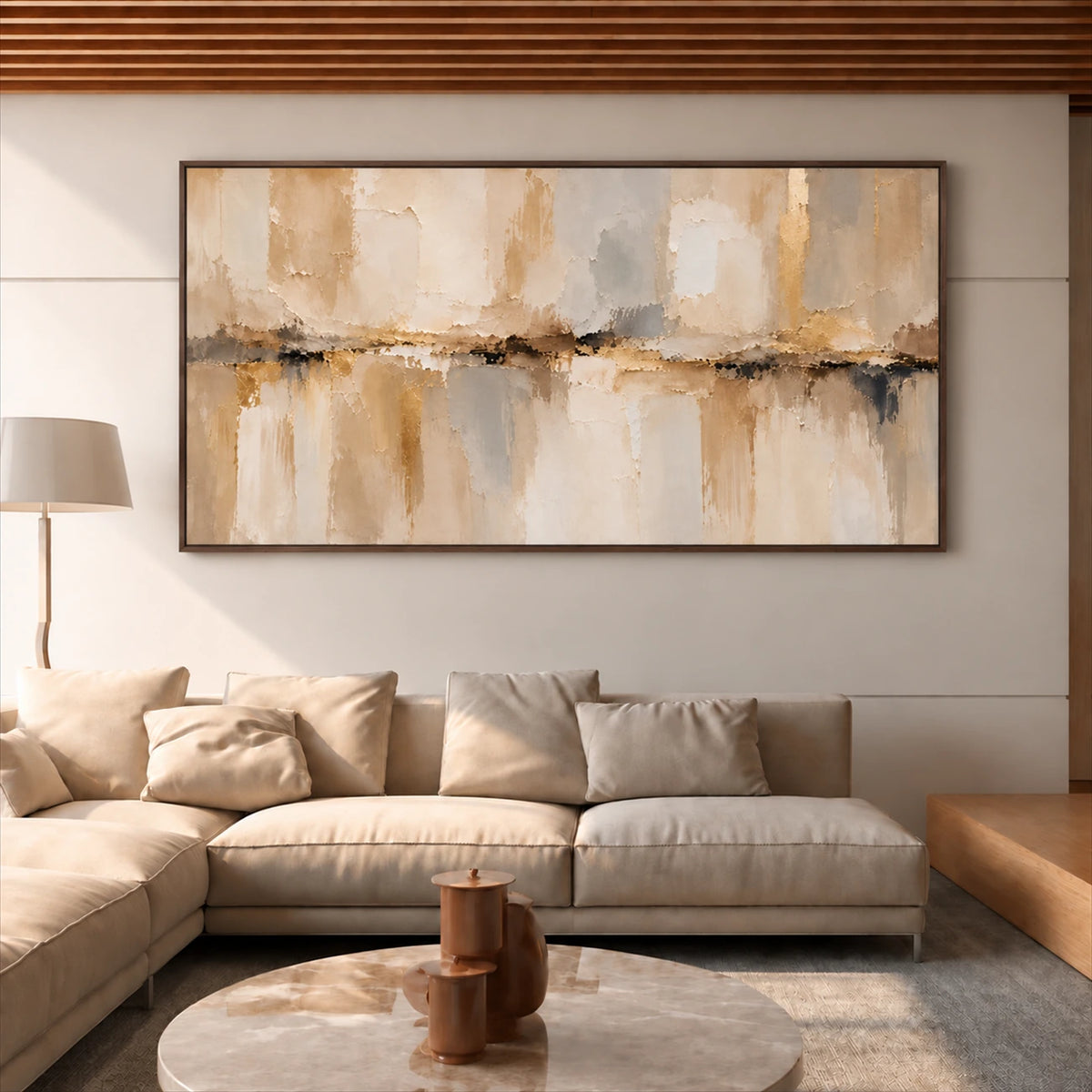 Sandstone Reflection painting above a cream sectional beneath a slatted wooden ceiling.