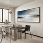 Silver Stillwater painting above a dark dining table in a bright minimalist room.